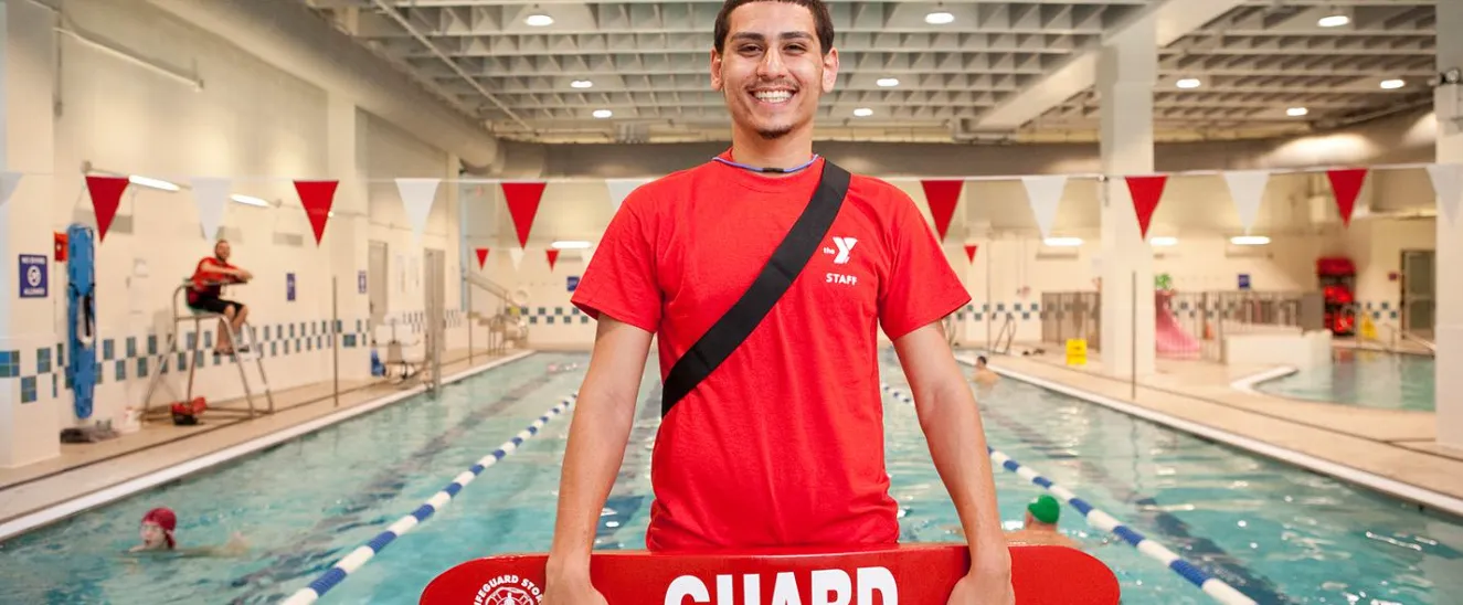 lifeguard in front of pool