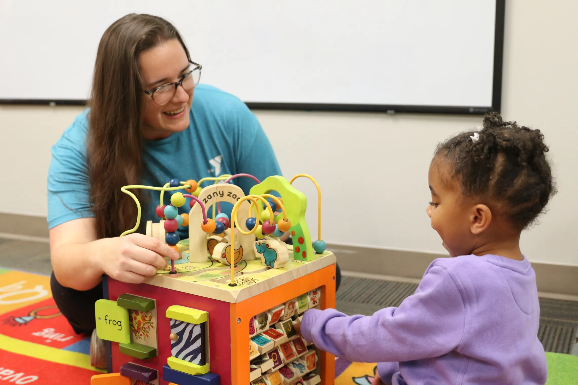 adult and child playing 