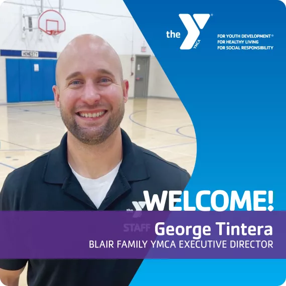 A man standing in a gymnasium
