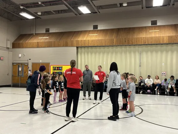 sports officials reading rules before game