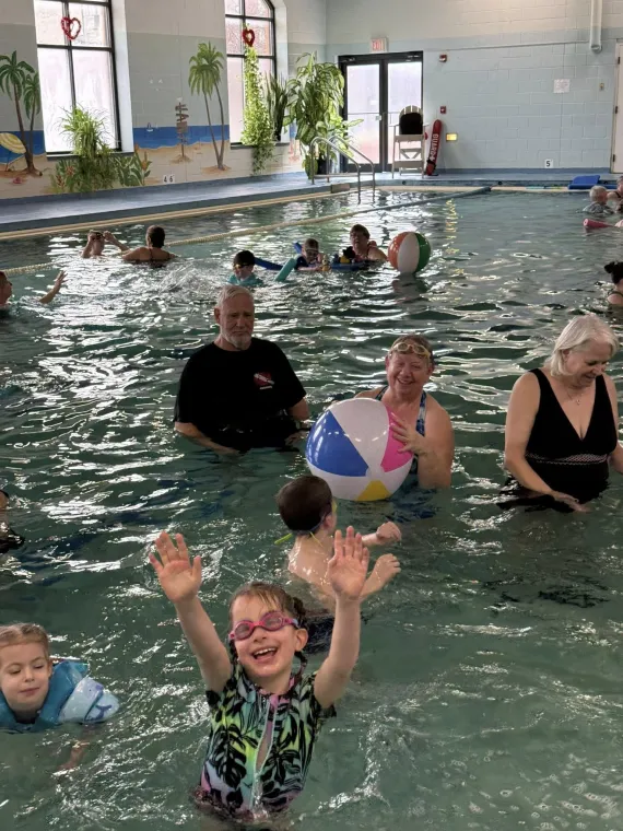 family in the pool