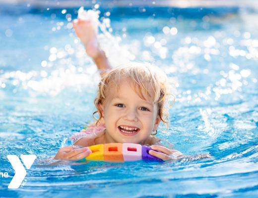 Child swimming in a pool