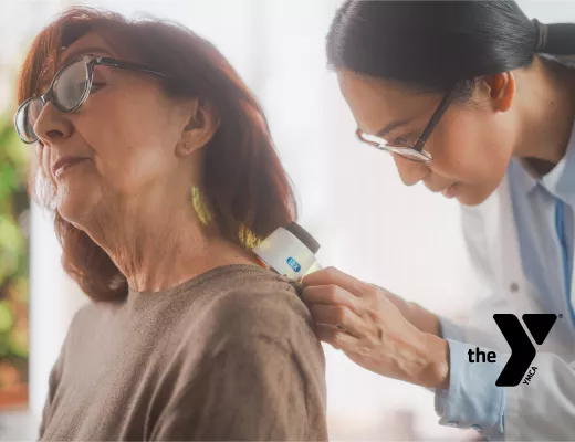 older woman getting a treatment from a doctor