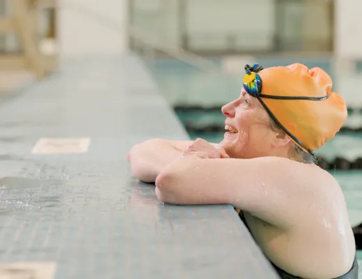 women looking out of pool