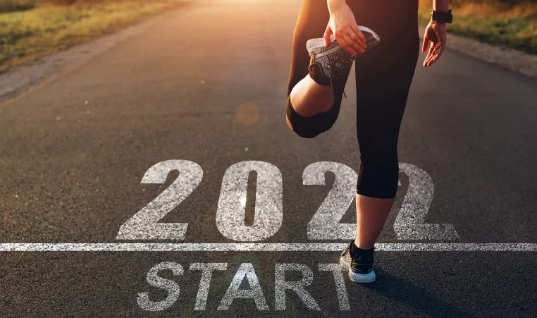 Image of a woman warming up before running