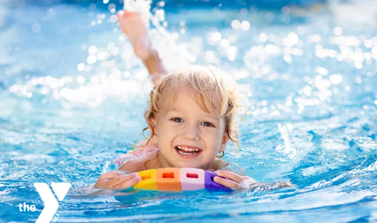 Child swimming in a pool