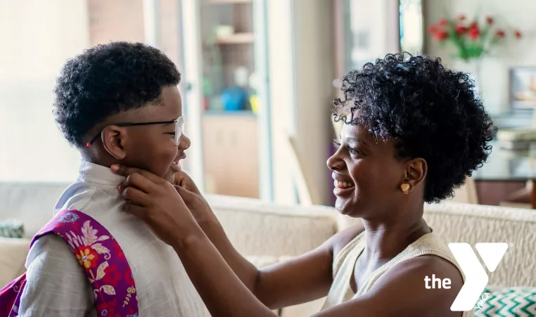 Mom getting child ready for school