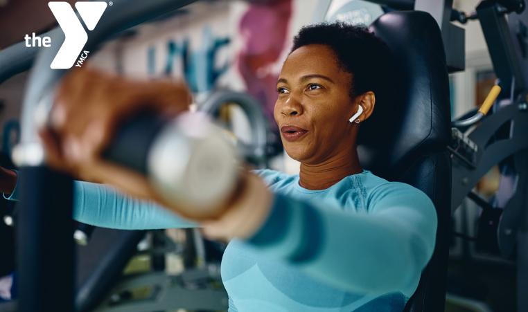 Woman working out with headphones in