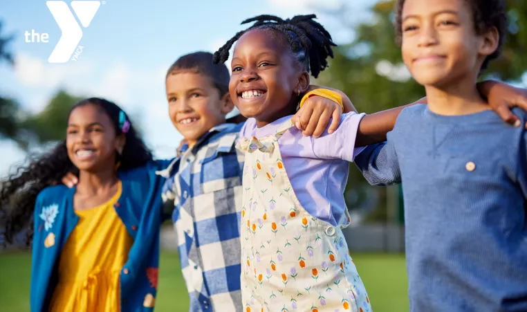 A group of young kids playing outside