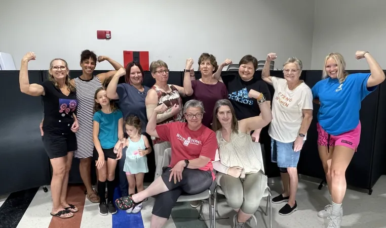 people flexing muscles 