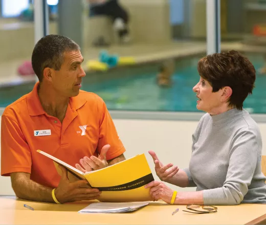 Livestrong student chatting with group leader