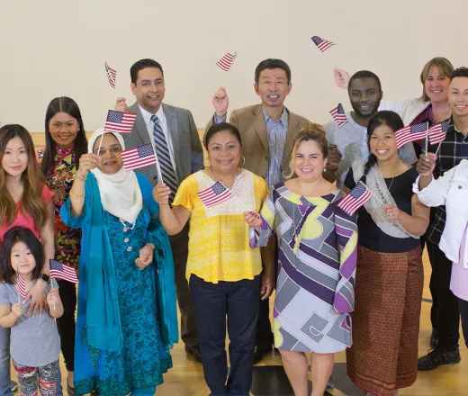Group of multi ethnic people with flags