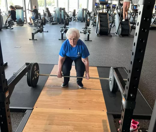 Senior woman lifting weights