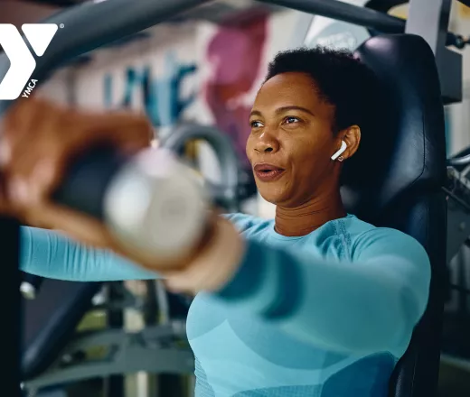 Woman working out with headphones in