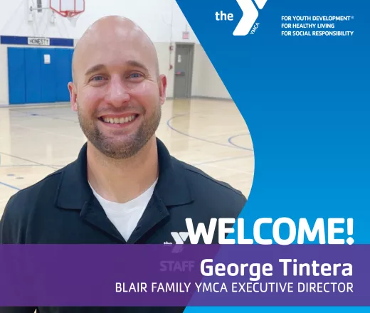 A man standing in a gymnasium