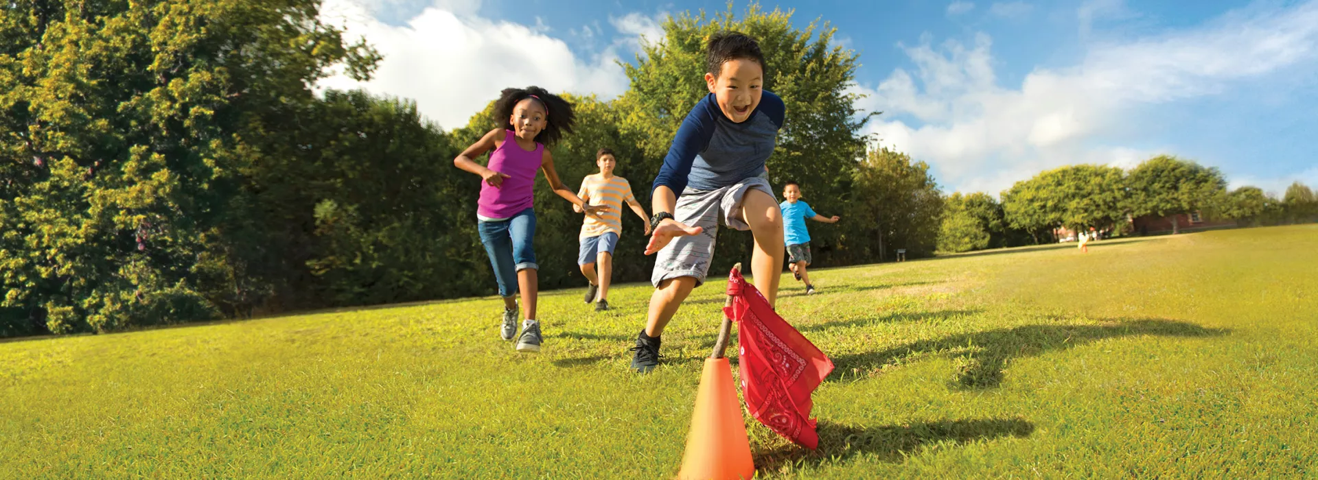 Kids playing an outdoor game at camp