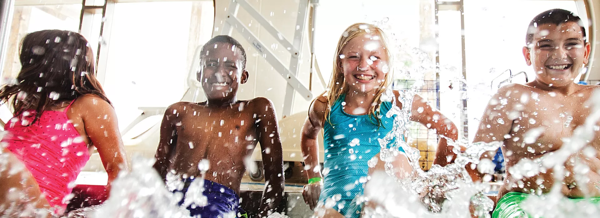 Kids splashing in the pool