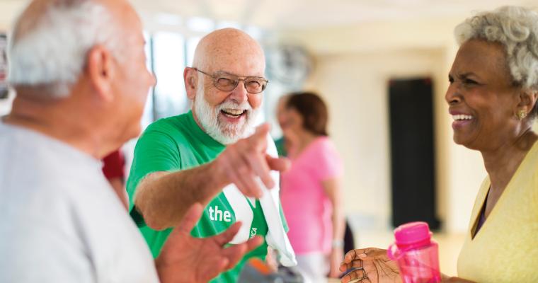 Active older adults chatting after fitness class