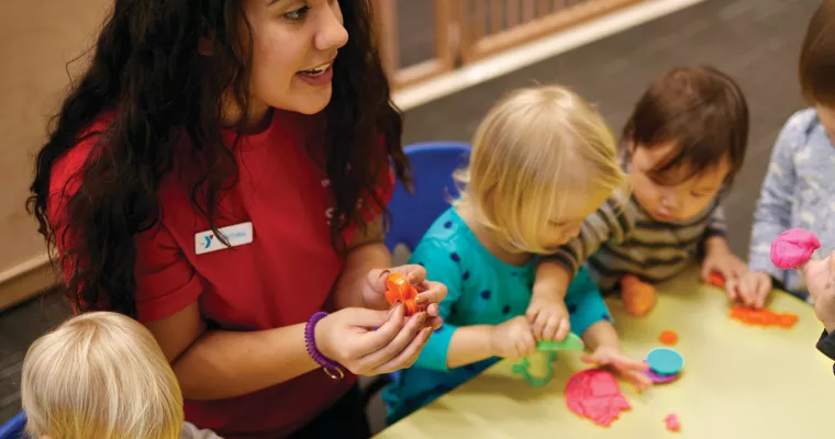 Teacher working with young children