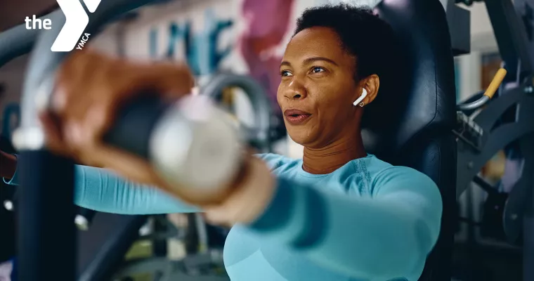 Woman working out with headphones in