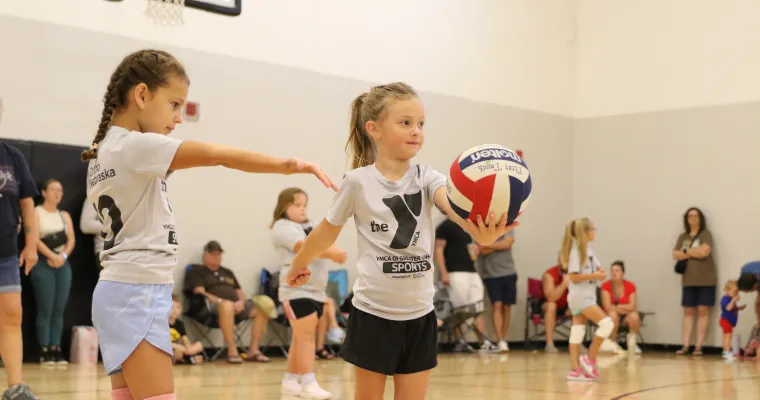 young girls playing volleyball